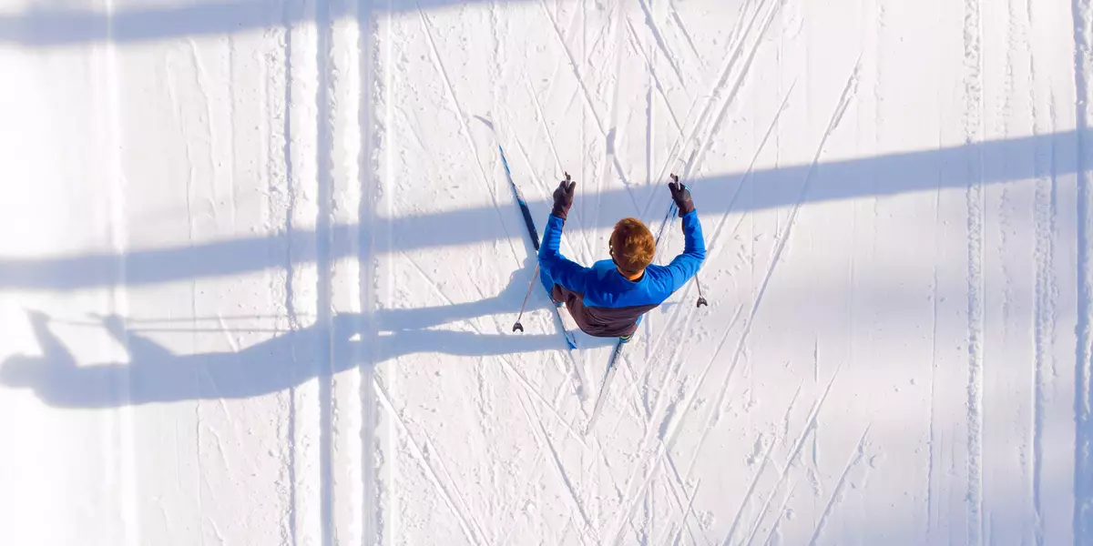 Skier cross-country skiing in snow forest. Winter competition, A